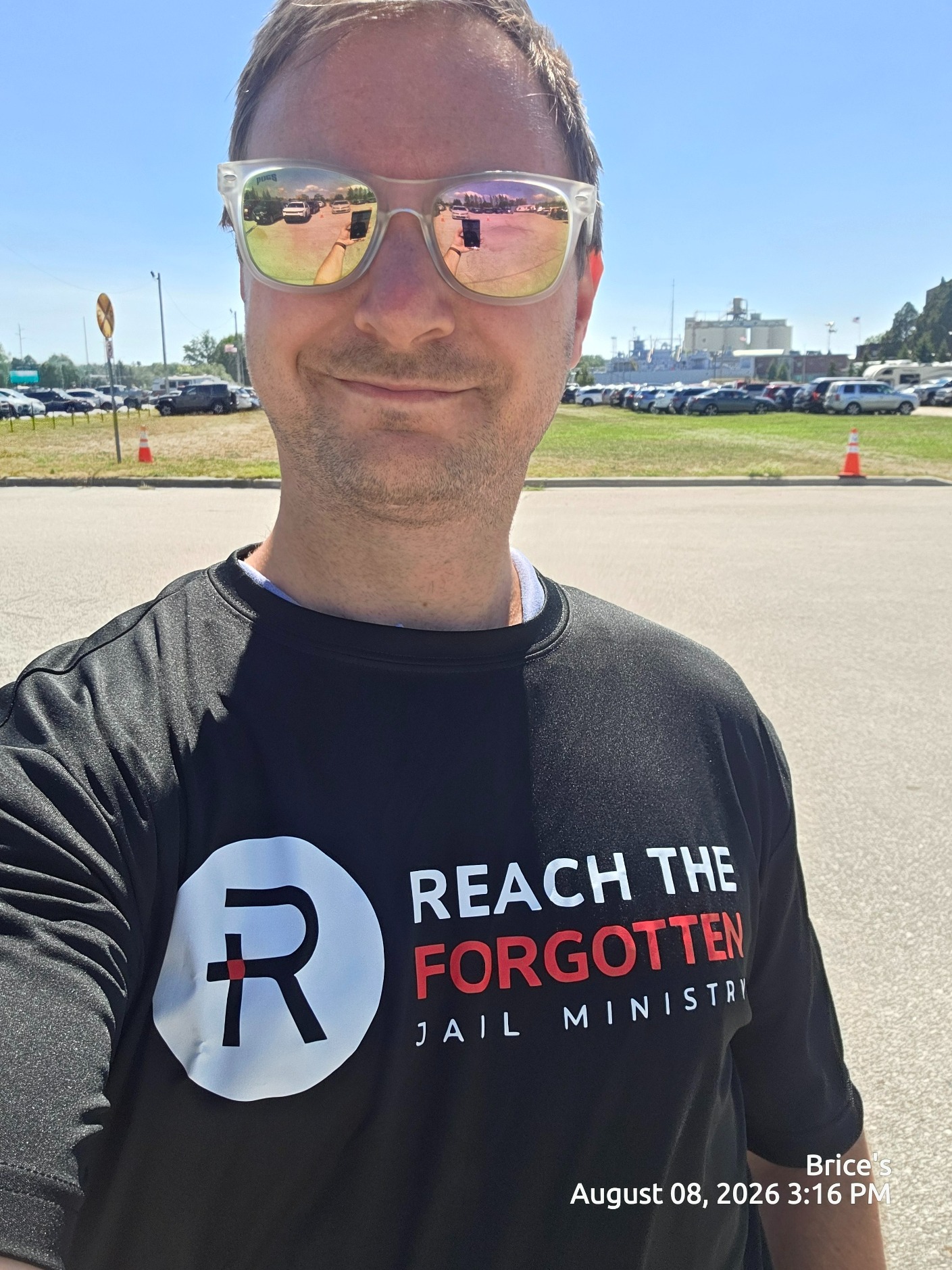 Personal photo of the owner wearing a community ministry shirt